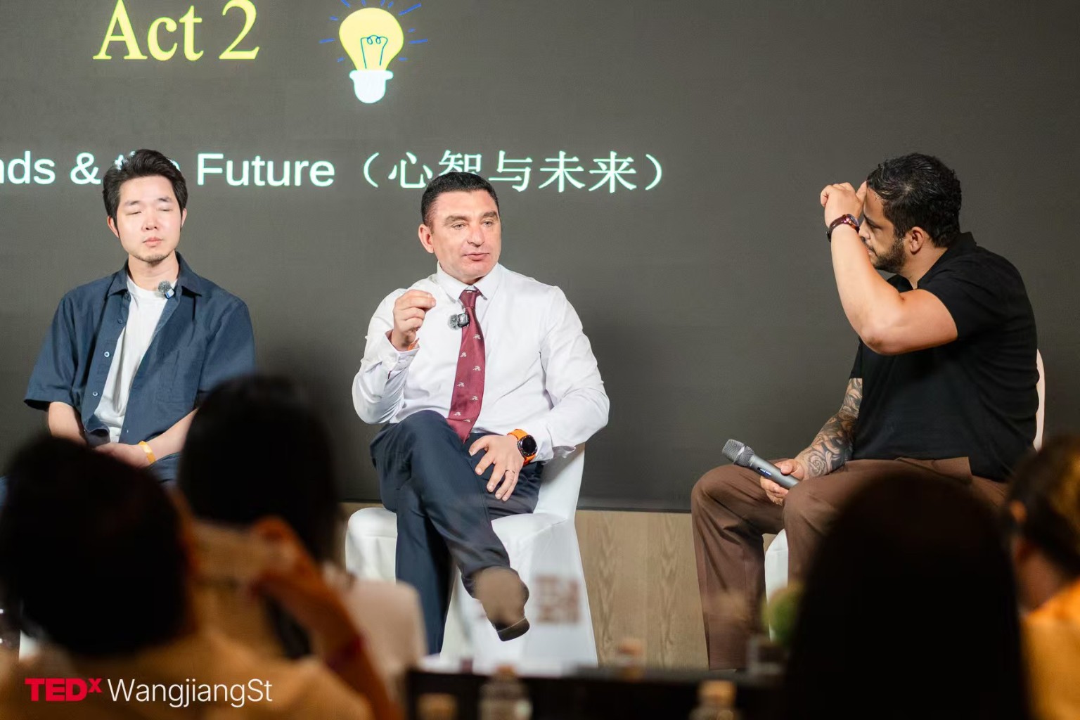 Dr. David Vainer speaking during the Minds and the Future panel at TEDxWangjiang St